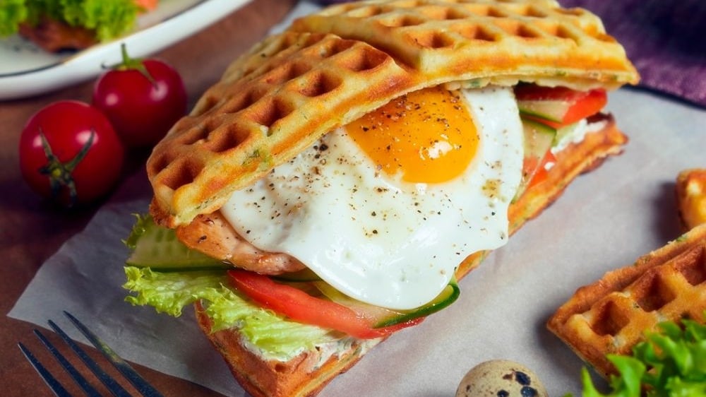 Waffle sandwich with chicken poached egg and cheese - Photo 26